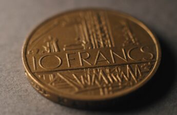 A close up of a coin on a table